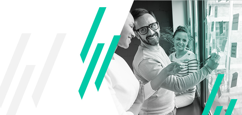 Create and use B2B buyer personas blog image team working at whiteboard 